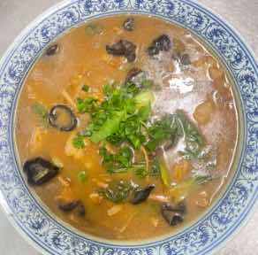 Sour soup with crispy meat · 酸汤酥肉
